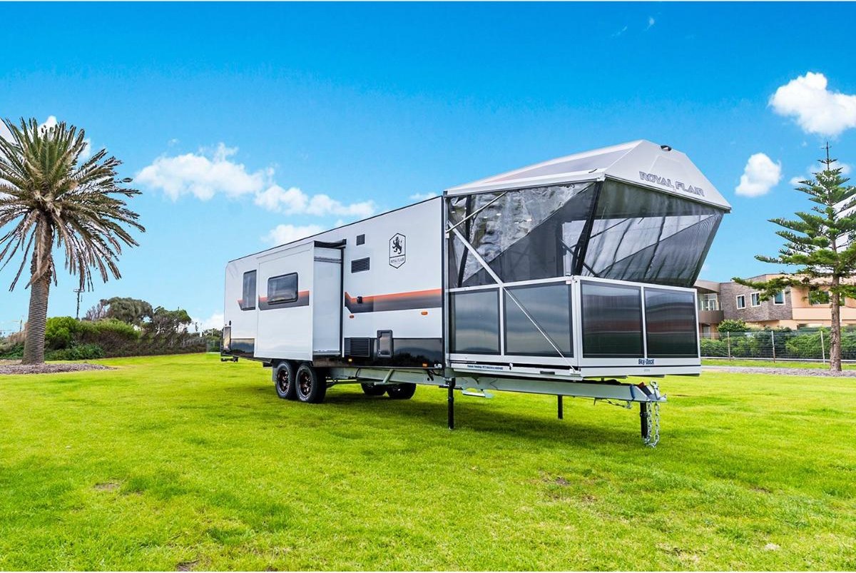 Royal Flair caravan parked on a clear, open field